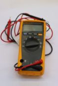 One pre-owned Fluke 175 true RMS Multimeter.