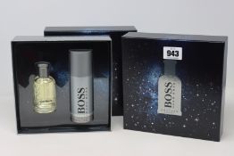 Three boxed as new Hugo Boss Bottled gift sets (Eau de toilette 50ml and deodorant spray 150ml).