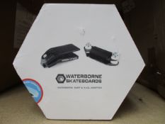 A boxed Waterborne Skateboards Surf and Rail Adapter.
