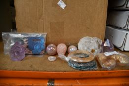 A large quantity of semi precious crystals to include rose quartz book ends, agate wind chimes and