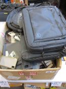 A box of assorted pre-owned covers/cases for phones, tablets and e-readers.