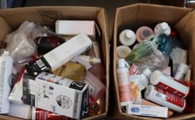 Two boxes of assorted toiletries.