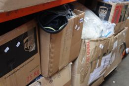 Seven boxes of assorted clothing and related items.