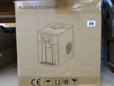 A boxed Portable Ice Maker HZB-12EH (2-pin plug, adapter included).