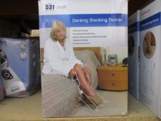 Four boxed as new Homecraft Dorking Stocking Donners.