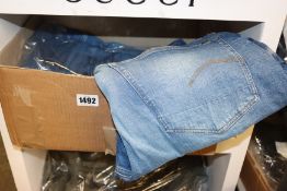Four pairs of as new G-Star Raw jeans.