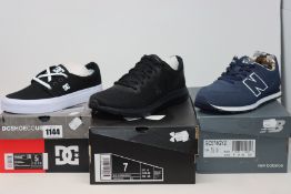 A pair of New Balance GC574GYZ trainers (UK 5), Under Armour Charged Impulse trainers (UK 6) and