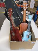 Four pre-owned ukulele's; a Frontier Tom 23 inch ukulele in mahogany rose wood, a Vangoa 21 inch