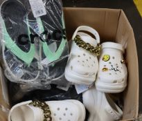 Eight pairs of assorted as new Crocs (6 x UK 4, 1 x 6/7, 1 x 7).