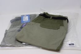 A large quantity of Bsapa Studio olive green skirts.