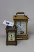 Two vintage clocks to include one Anstey Wilson England carriage clock and one Ansonia carriage