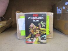 Twelve boxes of as new Dungeons and Dragons Arcane spell book cards.