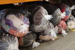 Ten bags of clothing and related items.