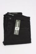 A pair of as new The Kooples black skinny jeans (32 - RRP £155).
