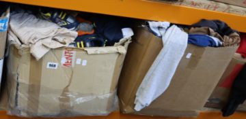 Four boxes of assorted clothing and related items.