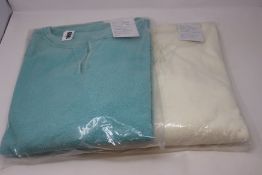 Six as new Free People oversized sweaters size XS (Colour: 3 x evening cream, 3 x emerald).