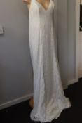 An as new Daisy by Katie Yeung Sand Lily wedding dress (Size unknown - RRP from £1130).
