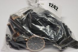 A collection of wrist watches to include David Wellington, Geneva, Biden, Marc Jacobs, Emporio