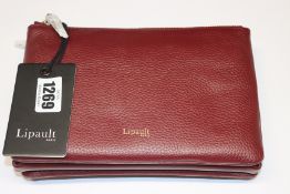 An as new Lipault Invitation multi pouch bag in burgundy.