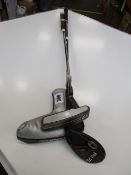A Ping G410 Fairway Wood right handed golf club and a Ping Sigma G Anser black nickel right handed