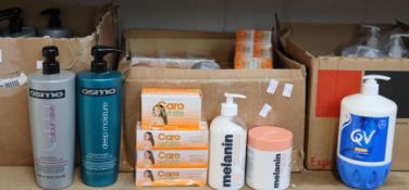 A quantity of Osmo 1000ml conditioners/shampoo, a quantity of Cara White beauty cream/soaps and a