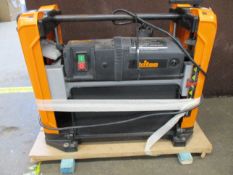 A pre-owned Triton TPT125 240V 1100W Thicknesser (Damaged) (Broken inner metal plate. Would need