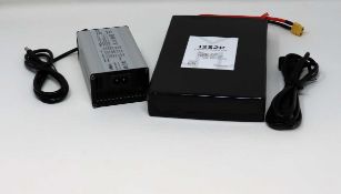 An as new M Boards 12S2P Complete Battery Solution (for DIY electric skateboards) (UK plug adaptor