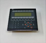 A pre-owned Beijer Electronics E300 HMI Operator Panel (Sold for spares or repair).