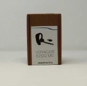 A boxed as new Plantronics Voyager 5200 UC Advanced NC Bluetooth Headset (box opened).