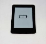 A pre-owned Amazon Kindle Paperwhite (DP75SDI) E-reader in Black (some cosmetic wear).