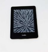 A pre-owned Amazon Kindle Paperwhite (EY21) E-reader in Black.