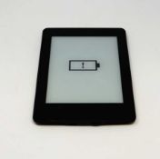 A pre-owned Amazon Kindle Paperwhite (DP75SDI) E-reader in Black (some cosmetic wear).