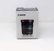 A boxed as new Canon EF 17-40mm f/4.0 L USM Lens with Case and Hood (box opened).