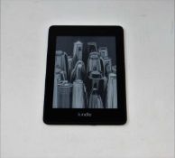 A pre-owned Amazon Kindle Paperwhite (PQ94WIF) E-Reader in Black.