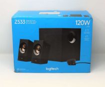 A boxed as new Logitech Z533 Speaker System with Subwoofer (box sealed, damage to box).