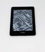 A pre-owned Amazon Kindle Paperwhite (PQ94WIF) E-Reader in Black.