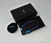 A boxed as new pair of Bose SoundSport Wireless Bluetooth Headphones in Aqua (Damage to packaging).