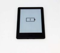 A pre-owned Amazon Kindle (SY68JL) E-reader in Black (some cosmetic wear).