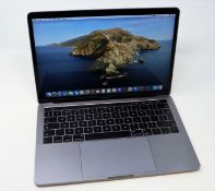 A pre-owned Apple MacBook Pro 13 (2016, Four Thunderbolt 3 Ports, Touchbar) with Intel Core i5 2.9
