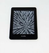A pre-owned Amazon Kindle Paperwhite (PQ94WIF) E-Reader in Black.