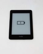 A pre-owned Amazon Kindle Paperwhite (PQ94WIF) E-Reader in Black.