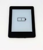 A pre-owned Amazon Kindle Paperwhite (DP75SDI) E-reader in Black (some cosmetic wear).