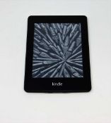 A pre-owned Amazon Kindle Paperwhite (EY21) E-reader in Black.