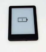 A pre-owned Amazon Kindle Paperwhite (J9G29R) E-reader in Black.