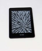 A pre-owned Amazon Kindle Paperwhite (PQ94WIF) E-Reader in Black.