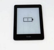 A pre-owned Amazon Kindle Voyager (NM460GZ) E-reader in Black (some cosmetic wear).