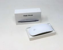A pre-owned Apple Magic Mouse 2 (boxed,some cosmetic wear to mouse and packaging).