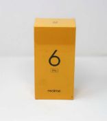 A boxed as new Realme 6 Pro RMX2063 128GB 8GB Dual Sim in Lightning Red (Checkmend report ID: