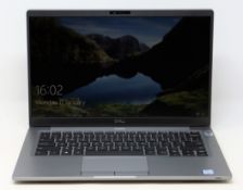 A pre-owned Dell Latitude 7400 14