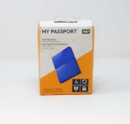 A boxed as-new WD My Passport 4TB Auto Backup Portable Hard Drive in Blue (box sealed, cosmetic